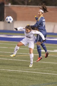 Kiara Reyes tries to handle the ball during Thursday afternoon's CIS quarterfinal loss. (Photo by Heather Davidson)