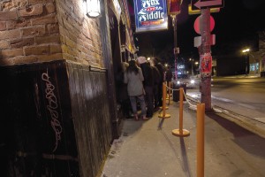 Students are increasingly finding that they're waiting in line longer at bars and clubs. (Photo by Heather Davidson) 